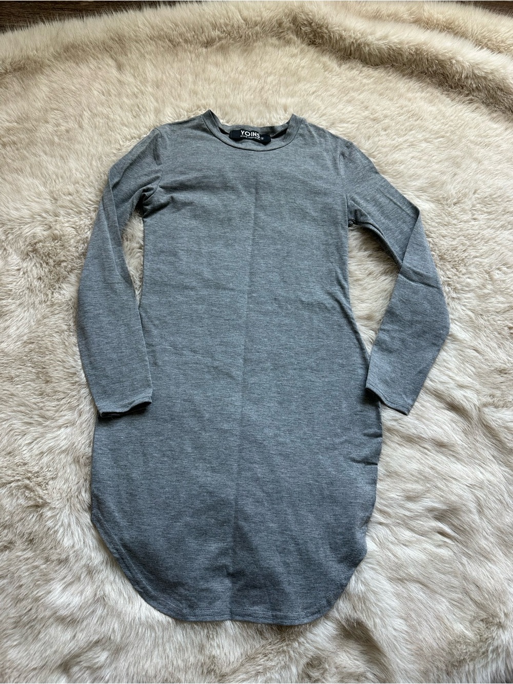 Long sleeved asymmetrical dress
